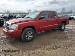 2007 Dodge Dakota SLT with VIN 1D7HW48J87S162047, listed as a Copart auction lot 51101885 with 115,438 mi miles and Salvage title. Bid and sale history available at DreamBid. Image 1.