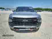 2023 Chevrolet Tahoe Z71 with VIN 1GNSKPKD0PR521471, listed as a Copart auction lot 65339615 with 57,973 mi miles and Salvage title. Bid and sale history available at DreamBid. Image 5.