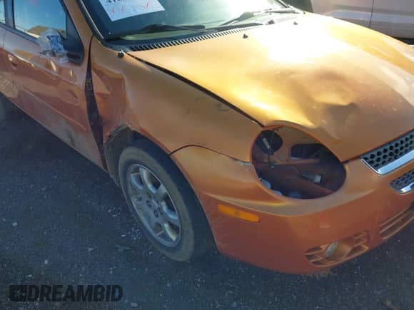 2005 Dodge Neon SXT z VIN 1B3ES56C75D264803, wystawiony jako IAAI lot #41688260 z przebiegiem 104 336 mil mil oraz . Historia ofert i sprzedaży dostępna na DreamBid. Obrazek 6.