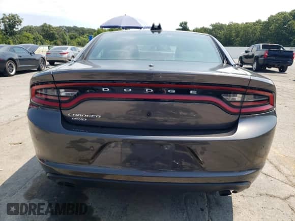 2021 Dodge Charger Police с VIN 2C3CDXKG9MH581945, выставлен на аукционе Copart как лот 67145615 с пробегом 58 454 миль миль и Списание • Salvage title. История ставок и продаж доступна на DreamBid. Изображение 6.