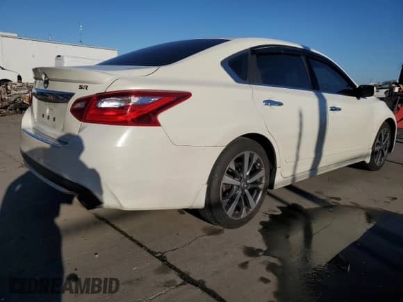 2016 Nissan Altima SR с VIN 1N4AL3AP7GC262086, выставлен на аукционе Copart как лот 82297355 с пробегом 164 496 миль миль и Списание • Salvage title. История ставок и продаж доступна на DreamBid. Изображение 3.