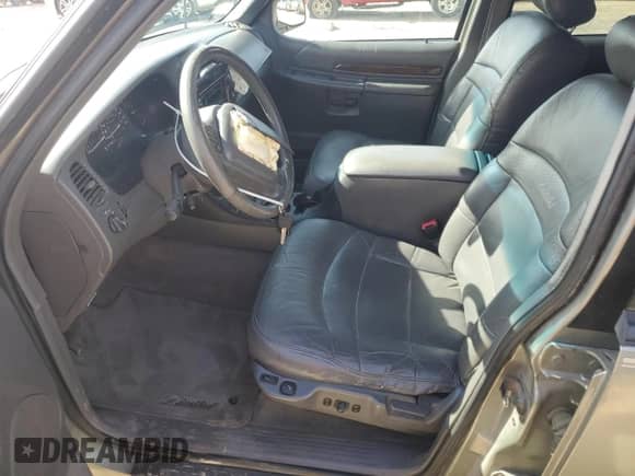 2000 Ford Explorer Limited with VIN 1FMDU75E9YUB50157, listed as a Copart auction lot 88743875 with 184,376 mi miles and Salvage title. Bid and sale history available at DreamBid. Image 7.