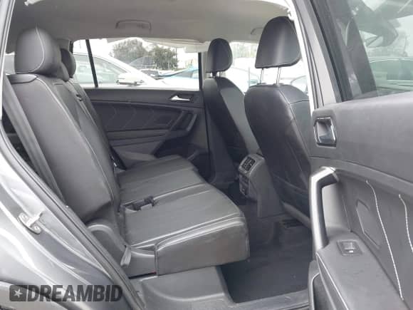 2023 Volkswagen Tiguan SE with VIN 3VV3B7AX0PM130980, listed as a IAAI auction lot 42158302 with 30,653 mi miles and . Bid and sale history available at DreamBid. Image 8.