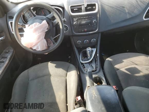 2012 Dodge Avenger SE с VIN 1C3CDZAB5CN147481, выставлен на аукционе Copart как лот 69565034 с пробегом Не указан миль и Списание • Salvage title. История ставок и продаж доступна на DreamBid. Изображение 8.