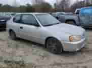 2002 Hyundai Accent GS z VIN KMHCG35CX2U210657, wystawiony jako Copart lot #85131504 z przebiegiem 91 354 mil mil oraz Czysty tytuł • Clean title. Historia ofert i sprzedaży dostępna na DreamBid. Obrazek 4.