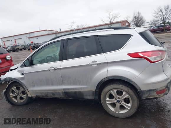 2014 Ford Escape SE with VIN 1FMCU0GX1EUD07872, listed as a IAAI auction lot 41189503 with 120,025 mi miles and . Bid and sale history available at DreamBid. Image 14.
