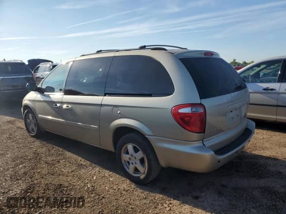 2007 Dodge Grand Caravan SXT with VIN 2D4GP44L87R218826, listed as a Copart auction lot 70884825 with 105,680 mi miles and Salvage title. Bid and sale history available at DreamBid. Image 2.