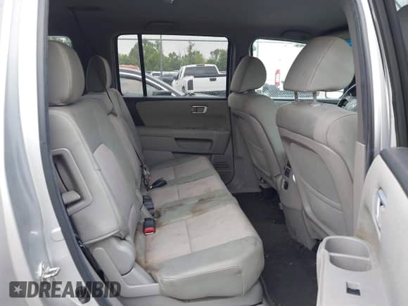 2012 Honda Pilot EX z VIN 5FNYF3H42CB009315, wystawiony jako IAAI lot #43295177 z przebiegiem 215 369 mil mil oraz . Historia ofert i sprzedaży dostępna na DreamBid. Obrazek 8.