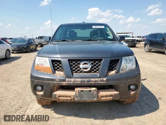 2010 Nissan Frontier SE with VIN 1N6AD0EVXAC409021, listed as a Copart auction lot 68933195 with 202,371 mi miles and Salvage title. Bid and sale history available at DreamBid. Image 5.
