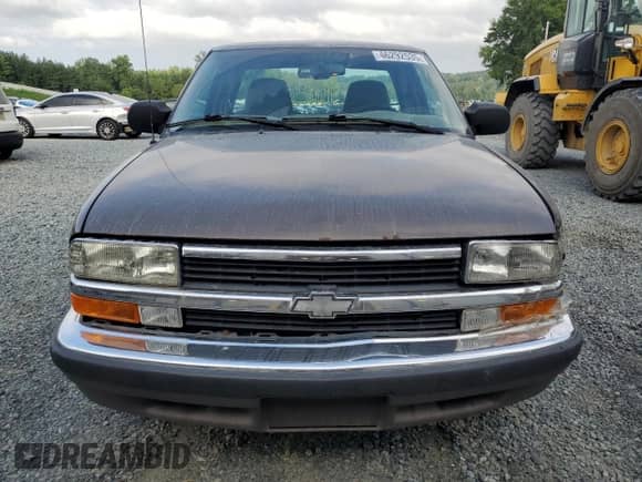 1998 Chevrolet S-10 LS с VIN 1GCCS19X0WK100710, выставлен на аукционе Copart как лот 61636495 с пробегом 216 032 миль миль и Списание • Salvage title. История ставок и продаж доступна на DreamBid. Изображение 5.