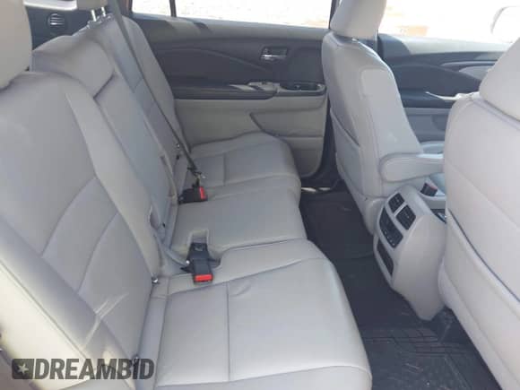 2018 Honda Pilot EX-L with VIN 5FNYF5H59JB028154, listed as a IAAI auction lot 43183673 with 107,907 mi miles and . Bid and sale history available at DreamBid. Image 8.