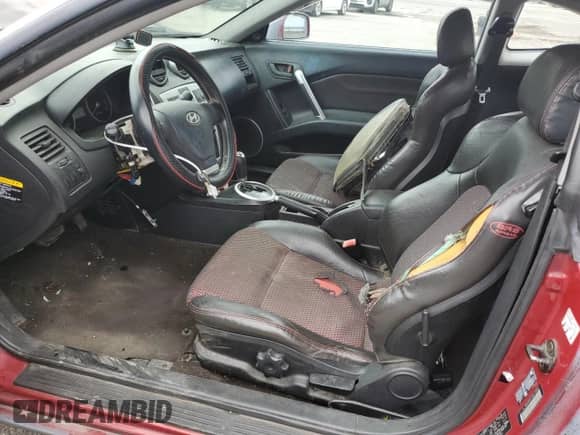 2005 Hyundai Tiburon GT с VIN KMHHN65F35U174824, выставлен на аукционе Copart как лот 81582545 с пробегом Не указан миль и Списание • Salvage title. История ставок и продаж доступна на DreamBid. Изображение 7.