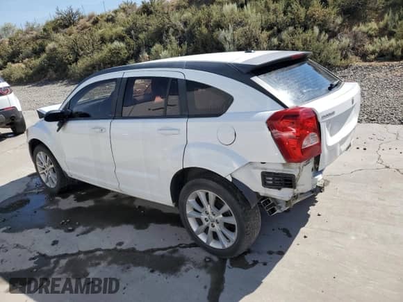 2011 Dodge Caliber Heat with VIN 1B3CB5HA7BD168362, listed as a Copart auction lot 62889895 with 129,138 mi miles and Salvage title. Bid and sale history available at DreamBid. Image 2.