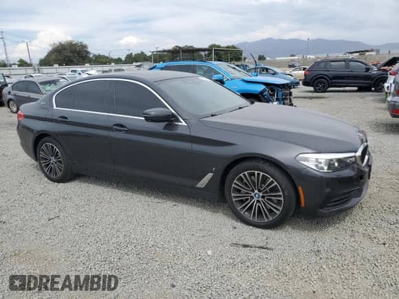 2019 BMW 5 Series 530e with VIN WBAJA9C58KB254167, listed as a Copart auction lot 70683805 with 63,890 mi miles and Salvage title. Bid and sale history available at DreamBid. Image 4.