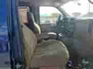 2004 Chevrolet Express Passenger with VIN 1GBFG15T041233492, listed as a Copart auction lot 82193815 with 219,338 mi miles and Salvage title. Bid and sale history available at DreamBid. Image 7.