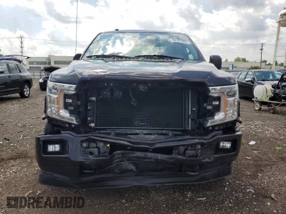 2018 Ford F-150 XL with VIN 1FTEW1E51JFB40541, listed as a Copart auction lot 68101065 with 56,280 mi miles and Salvage title. Bid and sale history available at DreamBid. Image 5.