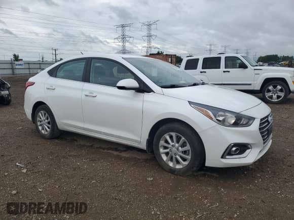 2022 Hyundai Accent SEL с VIN 3KPC24A61NE173722, выставлен на аукционе Copart как лот 58448715 с пробегом 21 854 миль миль и Списание • Salvage title. История ставок и продаж доступна на DreamBid. Изображение 4.