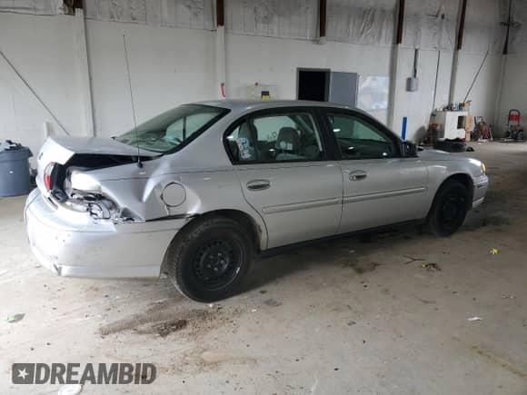 2004 Chevrolet Malibu Classic z VIN 1G1ND52F24M518238, wystawiony jako Copart lot #61443325 z przebiegiem 210 041 mil mil oraz Szkoda całkowita • Salvage title. Historia ofert i sprzedaży dostępna na DreamBid. Obrazek 3.