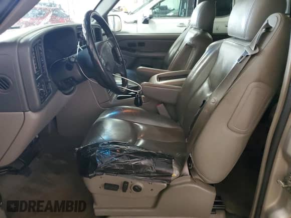 2005 Chevrolet Tahoe LS с VIN 1GNEK13T75J181599, выставлен на аукционе Copart как лот 69198965 с пробегом 290 655 миль миль и Списание • Salvage title. История ставок и продаж доступна на DreamBid. Изображение 7.