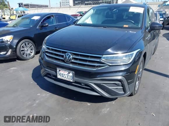 2023 Volkswagen Tiguan SE with VIN 3VVNB7AX2PM036365, listed as a IAAI auction lot 43104399 with 47,443 mi miles and . Bid and sale history available at DreamBid. Image 12.