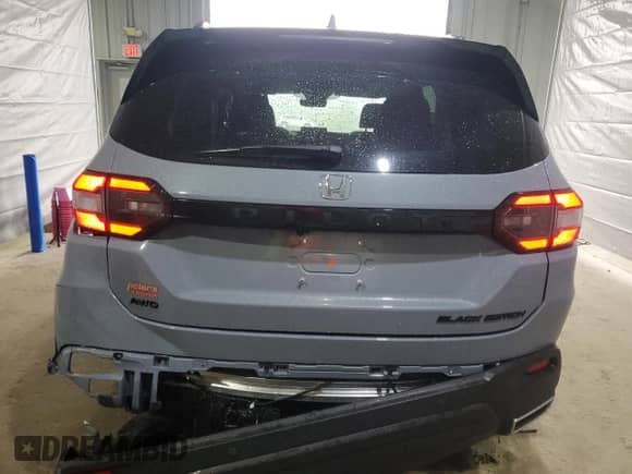 2025 Honda Pilot Black Edition с VIN 5FNYG1H90SB106430, выставлен на аукционе Copart как лот 55591055 с пробегом 764 миль миль и Списание • Salvage title. История ставок и продаж доступна на DreamBid. Изображение 6.