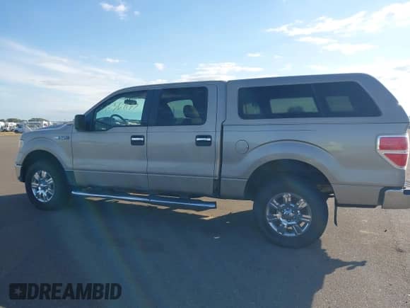 2010 Ford F-150 XL with VIN 1FTFW1EV1AKE36364, listed as a IAAI auction lot 43367197 with 302,801 mi miles and . Bid and sale history available at DreamBid. Image 14.