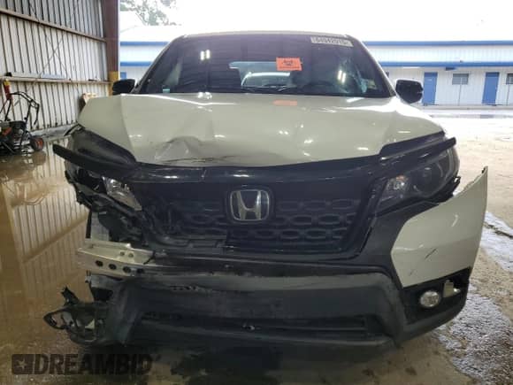 2021 Honda Passport EX-L с VIN 5FNYF7H54MB014209, выставлен на аукционе Copart как лот 64942915 с пробегом 89 504 миль миль и Списание • Salvage title. История ставок и продаж доступна на DreamBid. Изображение 5.