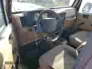 1999 Jeep Wrangler Sport with VIN 1J4FY19S9XP417531, listed as a Copart auction lot 86538315 with 161,004 mi miles and Salvage title. Bid and sale history available at DreamBid. Image 8.