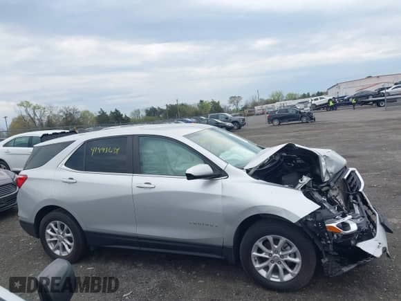 2021 Chevrolet Equinox LT with VIN 3GNAXTEV2MS143317, listed as a IAAI auction lot 41998639 with 85,097 mi miles and . Bid and sale history available at DreamBid. Image 14.