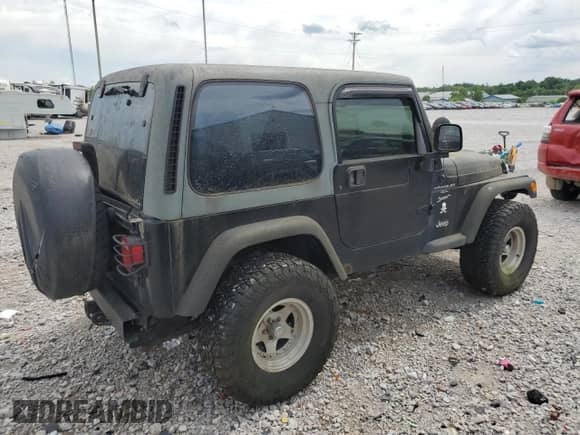 2000 Jeep Wrangler Sport z VIN 1J4FA49S7YP741858, wystawiony jako Copart lot #59058075 z przebiegiem 223 876 mil mil oraz Czysty tytuł • Clean title. Historia ofert i sprzedaży dostępna na DreamBid. Obrazek 3.