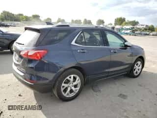 2018 Chevrolet Equinox Premier с VIN 3GNAXMEV7JS560837, выставлен на аукционе Copart как лот 84935975 с пробегом 113 101 миль миль и Списание • Salvage title. История ставок и продаж доступна на DreamBid. Изображение 3.