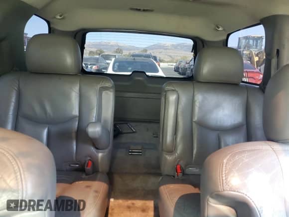 2004 Chevrolet Tahoe LS with VIN 1GNEC13T74R151824, listed as a Copart auction lot 70682005 with 204,620 mi miles and Salvage title. Bid and sale history available at DreamBid. Image 10.
