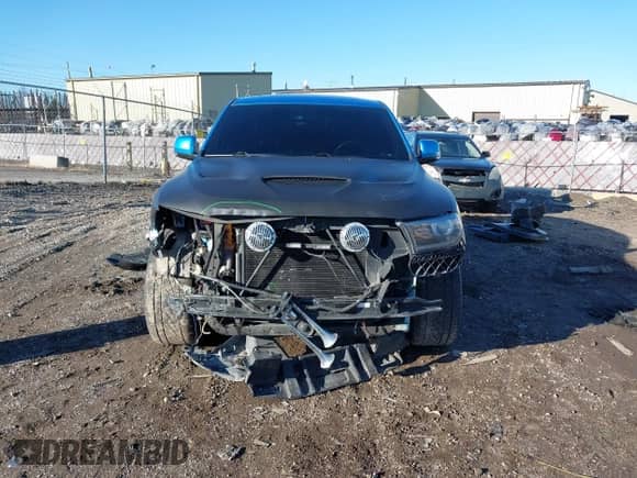2018 Dodge Durango SRT with VIN 1C4SDJGJ1JC415720, listed as a IAAI auction lot 41193674 with 63,140 mi miles and . Bid and sale history available at DreamBid. Image 13.