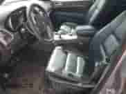 2014 Jeep Grand Cherokee Limited z VIN 1C4RJFBG7EC534037, wystawiony jako Copart lot #72049055 z przebiegiem 103 233 mil mil oraz Szkoda całkowita • Salvage title. Historia ofert i sprzedaży dostępna na DreamBid. Obrazek 7.