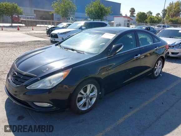 2013 Hyundai Sonata Limited with VIN 5NPEC4ACXDH615936, listed as a IAAI auction lot 43105995 with 152,583 mi miles and . Bid and sale history available at DreamBid. Image 2.