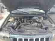 2004 Jeep Grand Cherokee Laredo with VIN 1J4GX48S24C314691, listed as a Copart auction lot 85491395 with 239,637 mi miles and Salvage title. Bid and sale history available at DreamBid. Image 12.