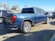 2022 GMC Sierra 1500 Denali with VIN 1GTU9FEL8NZ187617, listed as a IAAI auction lot 37979014 with 34,173 mi miles and . Bid and sale history available at DreamBid. Image 4.