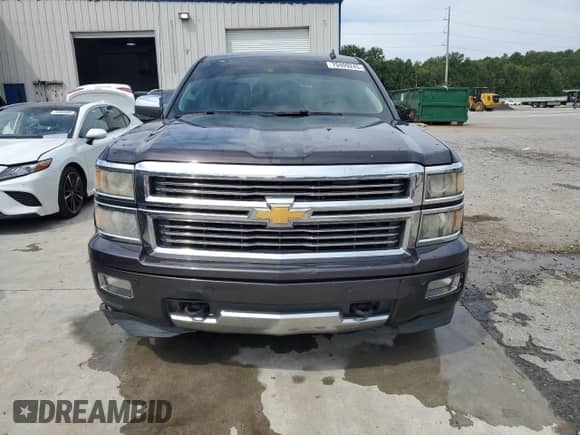 2014 Chevrolet Silverado 1500 High Country с VIN 3GCUKTEJ3EG543750, выставлен на аукционе Copart как лот 70409245 с пробегом Не указан миль и Списание • Salvage title. История ставок и продаж доступна на DreamBid. Изображение 5.