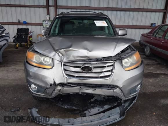 2011 Hyundai Santa Fe Limited z VIN 5XYZK3AB8BG039970, wystawiony jako IAAI lot #43027463 z przebiegiem 186 781 mil mil oraz . Historia ofert i sprzedaży dostępna na DreamBid. Obrazek 12.