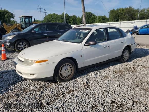 2001 Saturn LS with VIN 1G8JW52R21Y567982, listed as a Copart auction lot 67913024 with 124,198 mi miles and Salvage title. Bid and sale history available at DreamBid. Image 1.