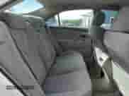 2009 Toyota Camry LE z VIN 4T1BE46KX9U806116, wystawiony jako Copart lot #85261255 z przebiegiem 196 982 mil mil oraz Czysty tytuł • Clean title. Historia ofert i sprzedaży dostępna na DreamBid. Obrazek 10.