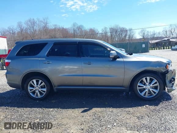 2011 Dodge Durango R/T with VIN 1D4SE6GT1BC712311, listed as a IAAI auction lot 41905530 with 149,940 mi miles and . Bid and sale history available at DreamBid. Image 14.