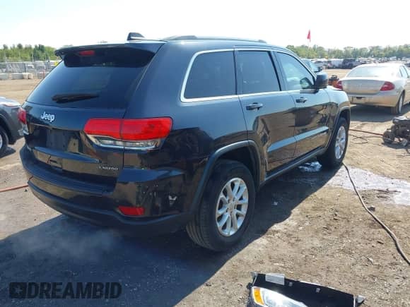 2015 Jeep Grand Cherokee Altitude with VIN 1C4RJFAGXFC207893, listed as a IAAI auction lot 43244156 with 131,514 mi miles and . Bid and sale history available at DreamBid. Image 4.