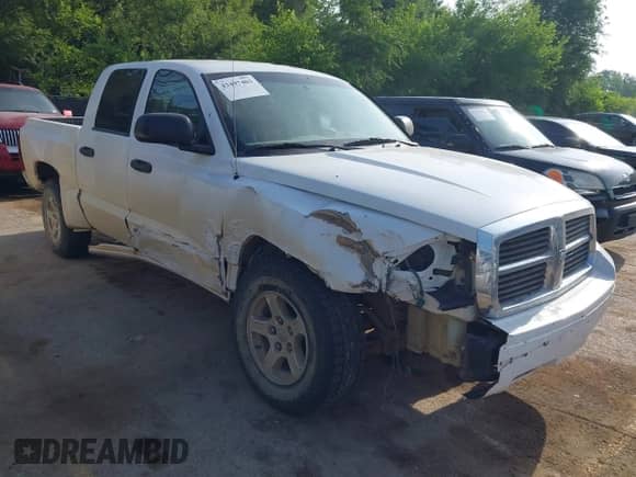 2007 Dodge Dakota SLT with VIN 1D7HE48K37S173856, listed as a IAAI auction lot 42497403 with 234,034 mi miles and . Bid and sale history available at DreamBid. Image 1.