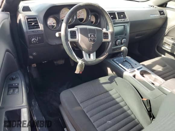 2014 Dodge Challenger R/T z VIN 2C3CDYBT4EH160607, wystawiony jako Copart lot #83985475 z przebiegiem 169 739 mil mil oraz Szkoda całkowita • Salvage title. Historia ofert i sprzedaży dostępna na DreamBid. Obrazek 8.