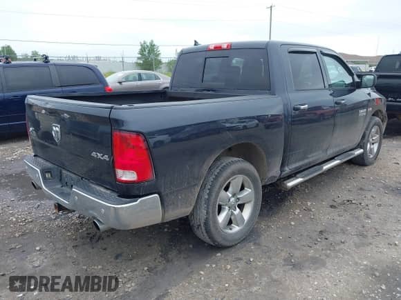 2015 Ram 1500 Outdoorsman with VIN 1C6RR7LT6FS767514, listed as a IAAI auction lot 42584441 with 180,442 mi miles and . Bid and sale history available at DreamBid. Image 4.