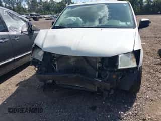 2009 Dodge Grand Caravan SE with VIN 2D8HN44E19R575827, listed as a IAAI auction lot 42812571 with 165,084 mi miles and . Bid and sale history available at DreamBid. Image 6.