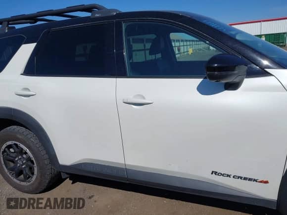 2023 Nissan Pathfinder Rock Creek with VIN 5N1DR3BD2PC270554, listed as a IAAI auction lot 42200457 with 18,249 mi miles and . Bid and sale history available at DreamBid. Image 13.