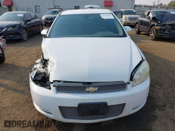 2013 Chevrolet Impala LS with VIN 2G1WF5E35D1240348, listed as a IAAI auction lot 43131336 with 137,558 mi miles and . Bid and sale history available at DreamBid. Image 12.