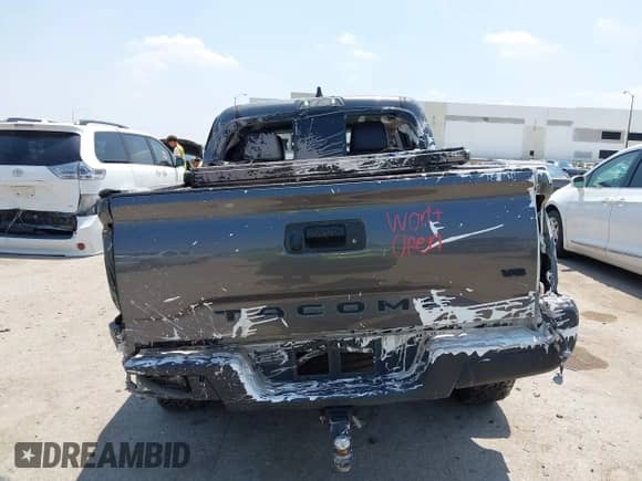2021 Toyota Tacoma SR5 with VIN 5TFAZ5CN1MX118036, listed as a IAAI auction lot 42840652 with 73,082 mi miles and . Bid and sale history available at DreamBid. Image 16.